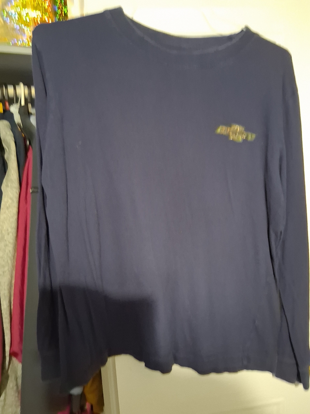 Classic Navy Long Sleeve Tee with Subtle Chest Emblem
